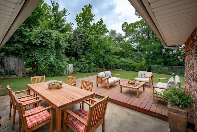 1527 N Pennsylvania Ave, Shawnee, OK 74804 - deck with a fenced backyard, an outdoor living space, outdoor dining area, and view of scattered trees