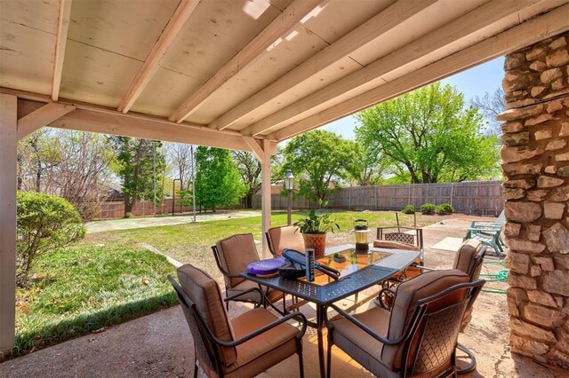 12108 Blue Sage Rd, Oklahoma City, OK 73120 - view of patio / terrace with a fenced backyard and outdoor dining area