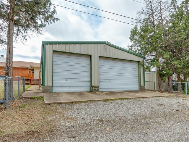 detached garage with fence