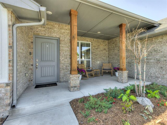 8512 NW 77th St, Oklahoma City, OK 73132 - view of exterior entry with covered porch