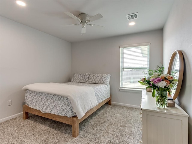 8512 NW 77th St, Oklahoma City, OK 73132 - bedroom featuring light carpet, baseboards, and visible vents