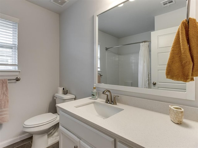 8512 NW 77th St, Oklahoma City, OK 73132 - bathroom with vanity, visible vents, curtained shower, and toilet