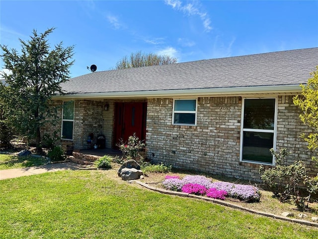 13989 US Highway 183, Hobart, OK 73651 - ranch-style home with a front lawn, brick siding, and roof with shingles