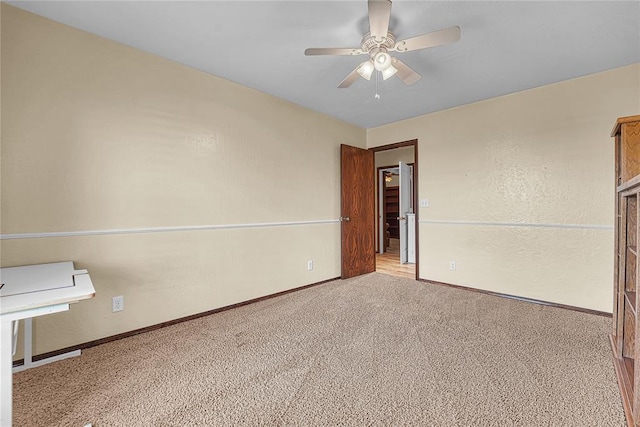 13989 US Highway 183, Hobart, OK 73651 - unfurnished bedroom featuring carpet floors, baseboards, and ceiling fan