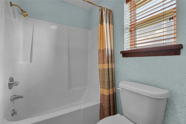 13989 US Highway 183, Hobart, OK 73651 - full bath with shower / bath combo with shower curtain, a textured wall, and toilet