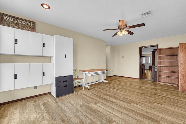13989 US Highway 183, Hobart, OK 73651 - spare room featuring ceiling fan, light wood-style floors, and baseboards