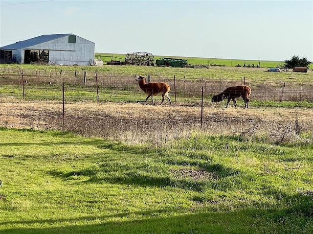 13989 US Highway 183, Hobart, OK 73651 - view of yard featuring a rural view, an outdoor structure, and a pole building