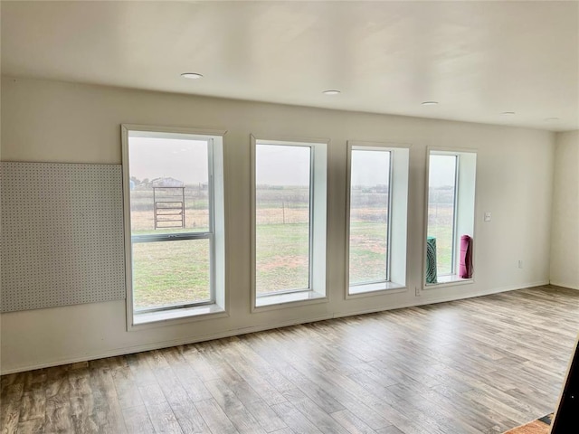 13989 US Highway 183, Hobart, OK 73651 - unfurnished room featuring wood finished floors and baseboards