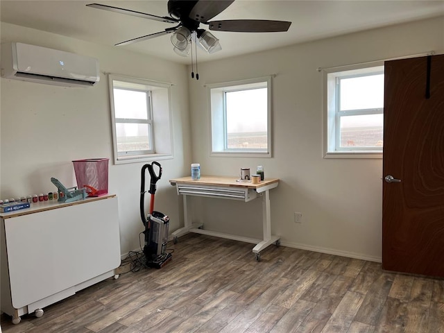 13989 US Highway 183, Hobart, OK 73651 - office space featuring a wall mounted air conditioner, wood finished floors, ceiling fan, and plenty of natural light