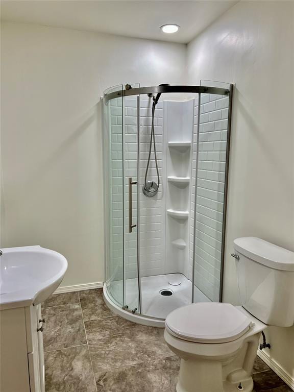 13989 US Highway 183, Hobart, OK 73651 - full bathroom with toilet, a shower stall, vanity, and baseboards