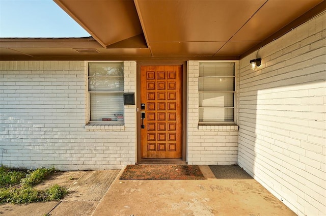 7440 NW 5th Ter, Oklahoma City, OK 73127 - view of exterior entry featuring brick siding