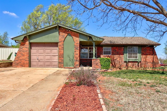 8633 Ambassador Rd, Oklahoma City, OK 73169 - view of front of home featuring a garage, brick siding, and concrete driveway