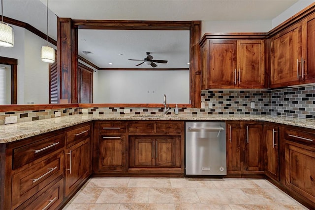 kitchen featuring ornamental molding, backsplash, a sink, light stone counters, and ceiling fan