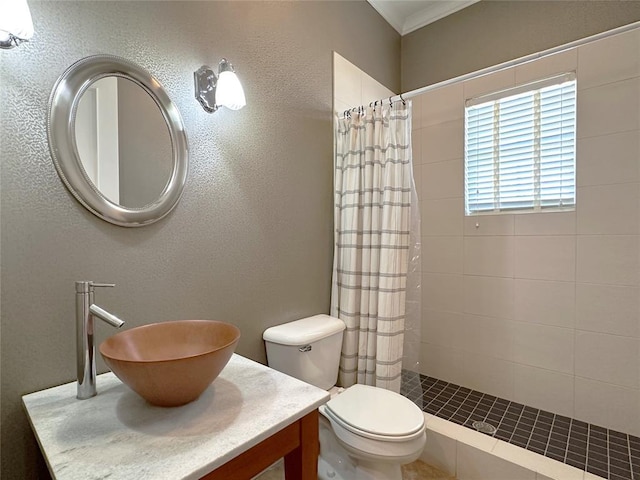 4000 Harrogate Dr, Norman, OK 73072 - full bathroom featuring a textured wall, vanity, toilet, and tiled shower