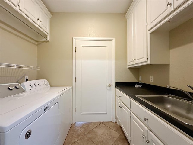 4000 Harrogate Dr, Norman, OK 73072 - laundry area featuring light tile patterned flooring, separate washer and dryer, cabinet space, and a sink
