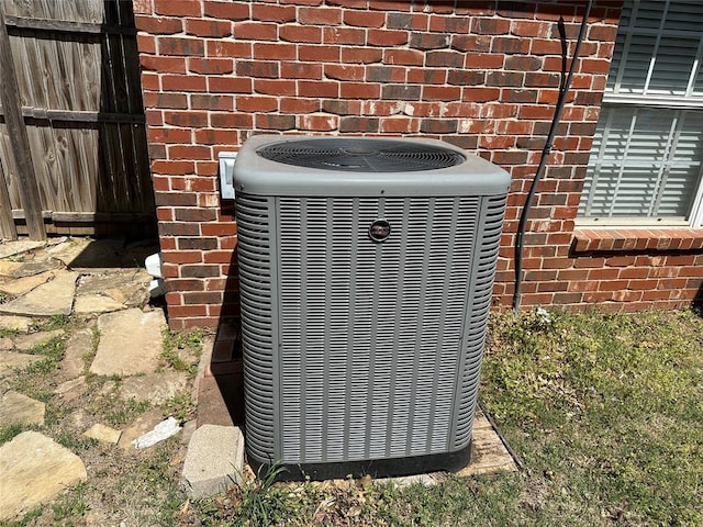 4000 Harrogate Dr, Norman, OK 73072 - exterior details featuring brick siding, central AC unit, and fence