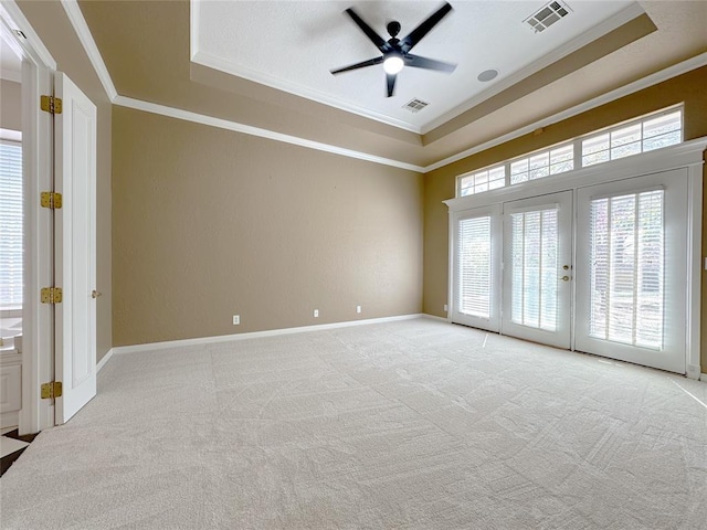 4000 Harrogate Dr, Norman, OK 73072 - unfurnished room with ornamental molding, visible vents, and a raised ceiling