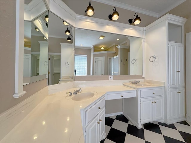4000 Harrogate Dr, Norman, OK 73072 - bathroom with tile patterned floors, a sink, crown molding, and double vanity