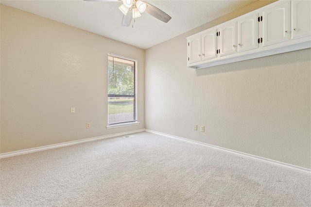 57 Serenada Ln, Shawnee, OK 74804 - carpeted spare room featuring a ceiling fan and baseboards