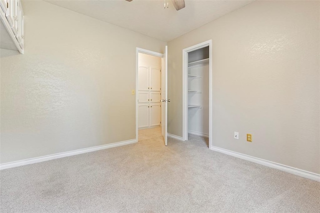 57 Serenada Ln, Shawnee, OK 74804 - unfurnished bedroom with light carpet, baseboards, a closet, and a ceiling fan