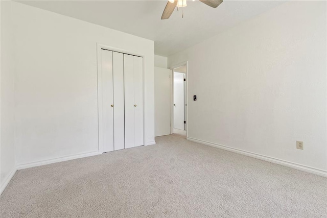 57 Serenada Ln, Shawnee, OK 74804 - unfurnished bedroom with light carpet, a closet, baseboards, and ceiling fan