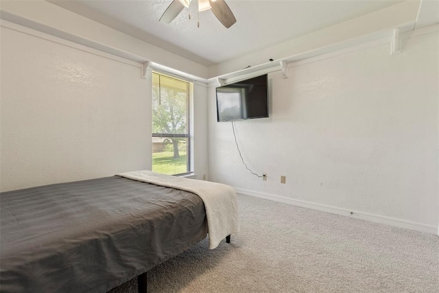 57 Serenada Ln, Shawnee, OK 74804 - bedroom featuring carpet floors, a ceiling fan, and baseboards