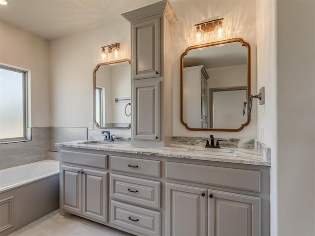 1209 Jozie Way, Tuttle, OK 73089 - full bathroom with a sink, a bath, tile patterned flooring, and double vanity