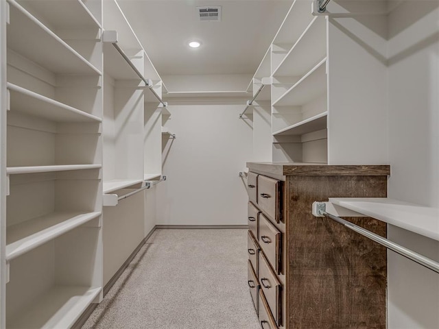 1209 Jozie Way, Tuttle, OK 73089 - spacious closet with visible vents and light colored carpet