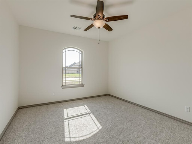 1209 Jozie Way, Tuttle, OK 73089 - unfurnished room with visible vents, baseboards, ceiling fan, and light colored carpet