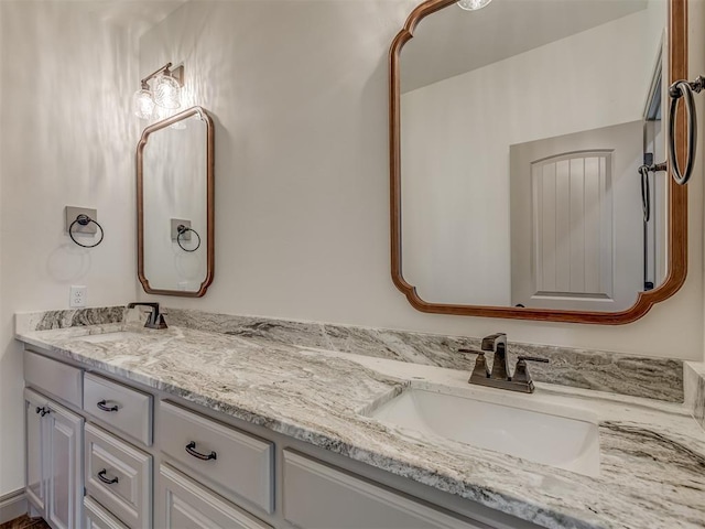 1209 Jozie Way, Tuttle, OK 73089 - bathroom featuring double vanity and a sink