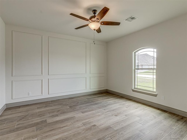 1212 Jaden Blvd, Tuttle, OK 73089 - unfurnished room with a ceiling fan, light wood-type flooring, and baseboards