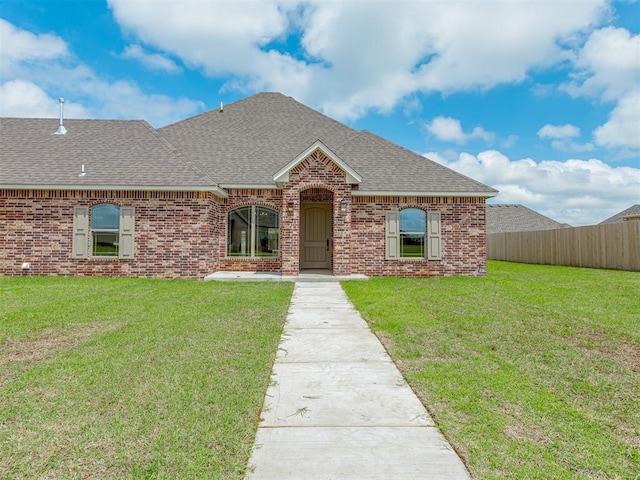1212 Jaden Blvd, Tuttle, OK 73089 - view of front facade featuring roof with shingles and brick siding