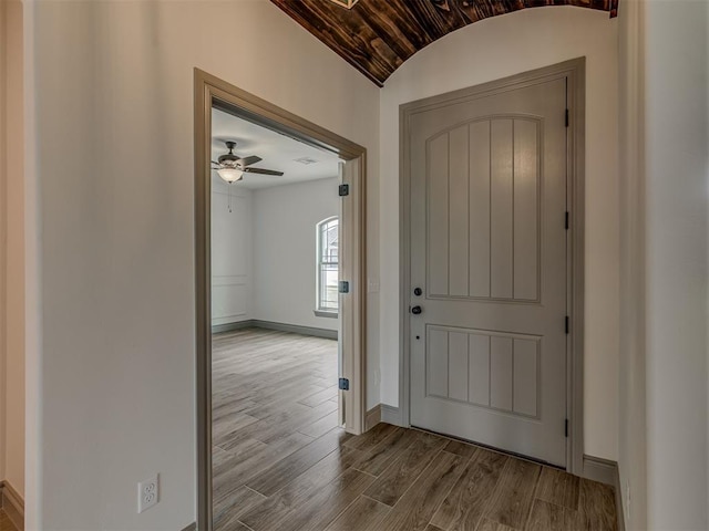 1212 Jaden Blvd, Tuttle, OK 73089 - foyer entrance featuring wood finished floors, baseboards, vaulted ceiling, and ceiling fan