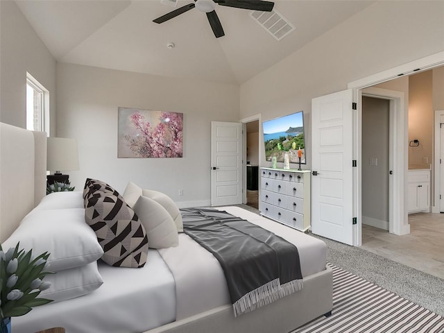 bedroom featuring light carpet, baseboards, visible vents, and high vaulted ceiling