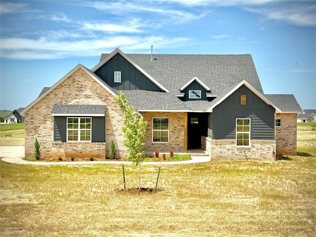 4253 Hawthorne St, Piedmont, OK 73078 - craftsman-style house with board and batten siding, roof with shingles, and a front yard