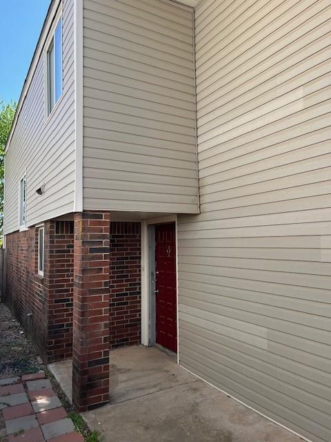 2709 Bishops Dr, Norman, OK 73072 - exterior space featuring brick siding