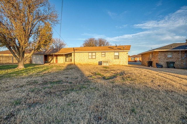834 Mimosa Dr, Watonga, OK 73772 - back of house featuring fence and a lawn