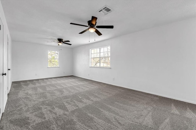 636 E Lea Ter, Mustang, OK 73064 - empty room with carpet flooring, a ceiling fan, and baseboards