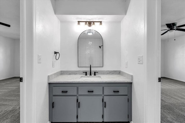 636 E Lea Ter, Mustang, OK 73064 - full bath featuring a ceiling fan, vanity, and baseboards