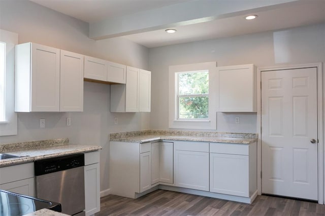 kitchen featuring recessed lighting, light countertops, white cabinets, dishwasher, and wood finished floors