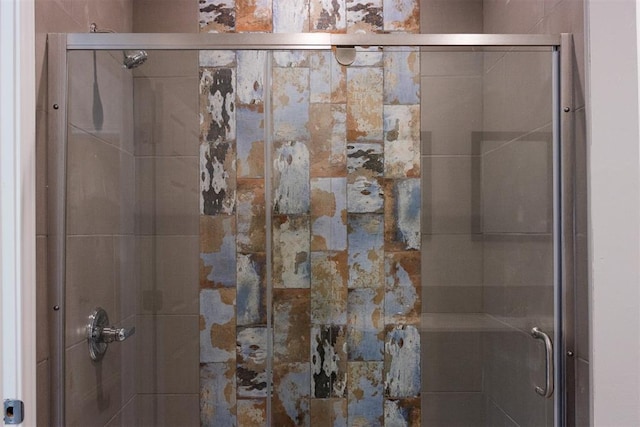 bathroom featuring a shower stall