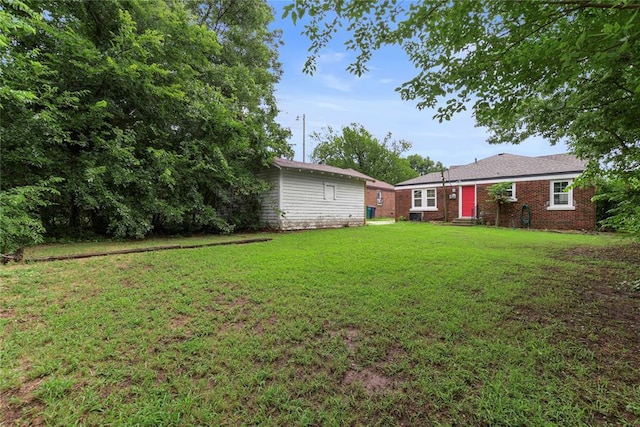 view of yard with entry steps