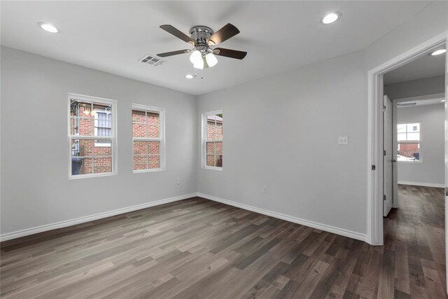 unfurnished bedroom with recessed lighting, visible vents, baseboards, and wood finished floors