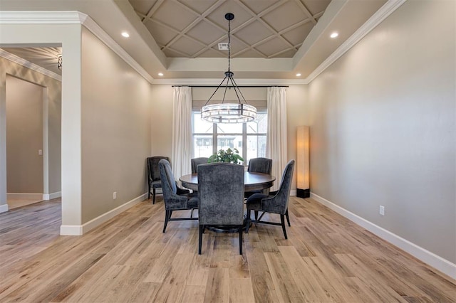 dining room featuring baseboards, light wood-type flooring, a chandelier, crown molding, and coffered ceiling