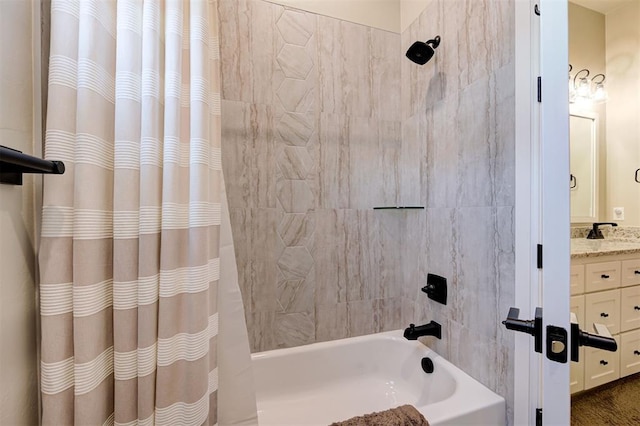 full bathroom featuring shower / bath combo with shower curtain and vanity