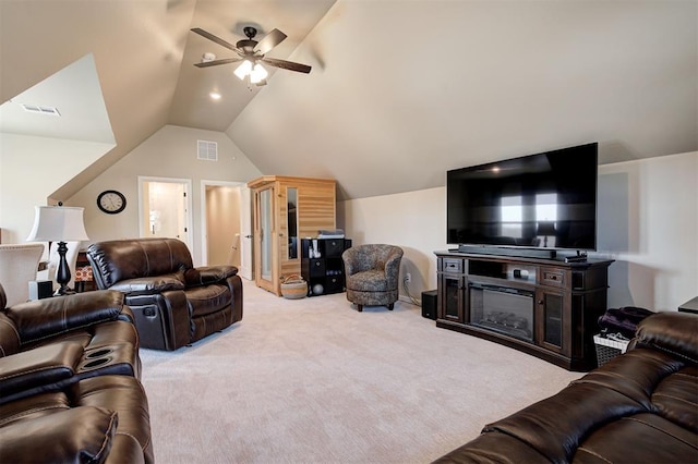 carpeted living room featuring visible vents, a ceiling fan, and lofted ceiling