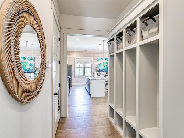 29 Water St Unit 10G, Carlton Landing, OK 74432 - mudroom with light wood finished floors and a sink