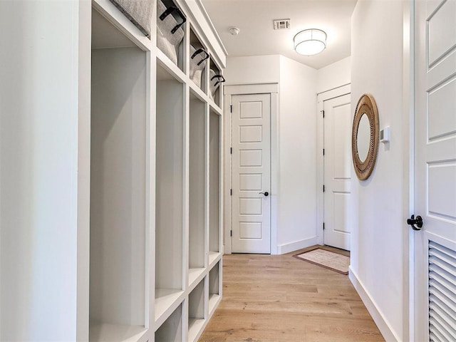 29 Water St Unit 10G, Carlton Landing, OK 74432 - mudroom featuring light wood finished floors, visible vents, and baseboards