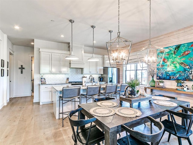 29 Water St Unit 10G, Carlton Landing, OK 74432 - dining area featuring a chandelier, light wood finished floors, baseboards, and recessed lighting