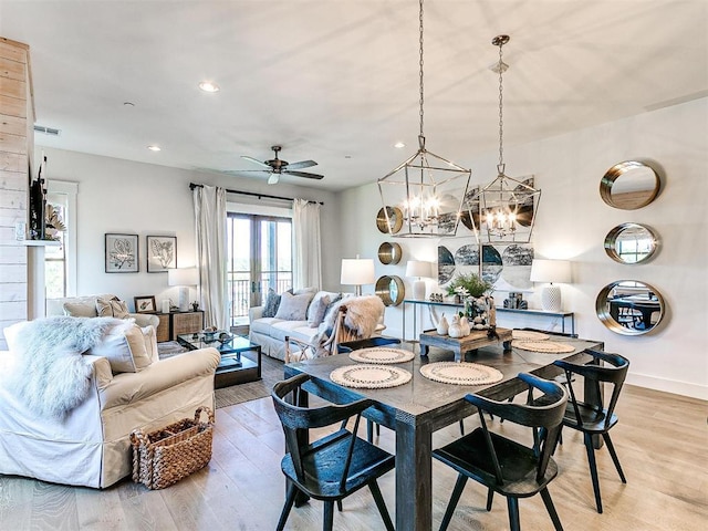 29 Water St Unit 10G, Carlton Landing, OK 74432 - dining room featuring recessed lighting, light wood finished floors, and ceiling fan with notable chandelier